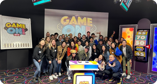 Vesta team posing together at Game On!